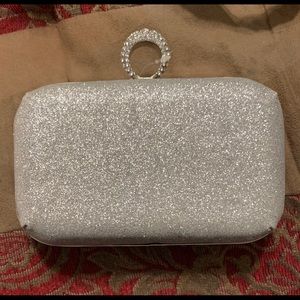 Silver glittery hand help purse. Brand new